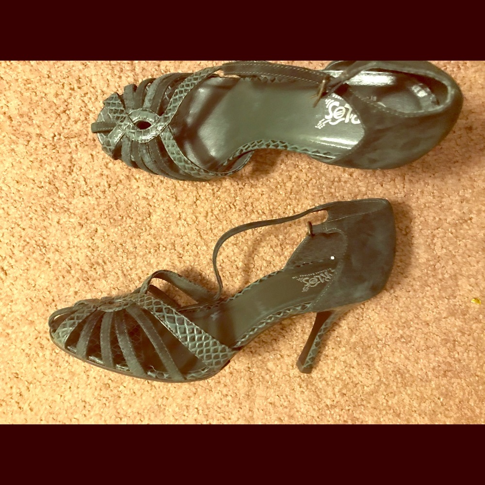 High heeled shoes